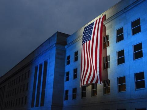 The Pentagon is illuminated with a large American flag during a Sept. 11 remembrance ceremony. In response to the 2001 terrorist attacks, the Army activated the 20th CBRNE Command to unify its chemical, biological, radiological, nuclear and explosives forces. Credit: Courtesy photo/20th CBRNE Command