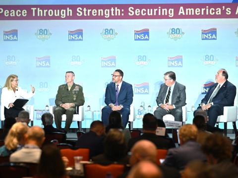 Participants of the strategic priorities panel gather on stage at the 2026 Intelligence & National Security Summit on August 27 in Bethesda, Maryland. Credit: Herman Farrer Photography