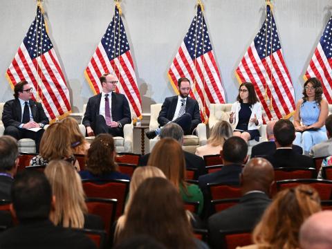 Intelligence professionals explain the threats that may arise in the post-quantum cryptography era at the Intelligence & National Security Summit on August 26, 2026. Credit: Herman Farrer Photography
