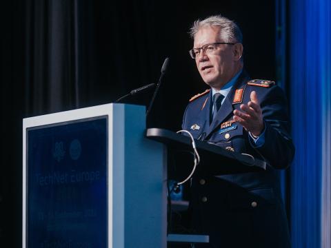 Maj. Gen. Armin Fleischmann, DEU AF, commander of the Cyber and Information Domain (CID) Support Forces and deputy chief of staff of the Capabilities CID Command at the Ministry of Defence in Germany, addresses TechNet Europe 2026 in Berlin. Credit: Robin Wulff