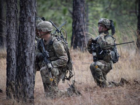 A team leader with 1st Battalion, 504th Parachute Infantry Regiment, directs movements of his team using the Harris Leader Radio during an assault on an objective during the initial operating test for the system. The rapid development and fielding of cutting-edge systems help drive the need for agility and adaptability at Army signal and cyber schools. Nicholas Robertson, U.S. Army Operational Test Command Visual Information Specialist