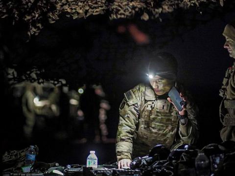 Two U.S. Army officers prepare for a fire mission at Pohakuloa Training Area, Hawaii. The Indo-Pacific region stands to benefit from greater emphasis on high-frequency (HF) communications over the vast area. U.S. Army photo