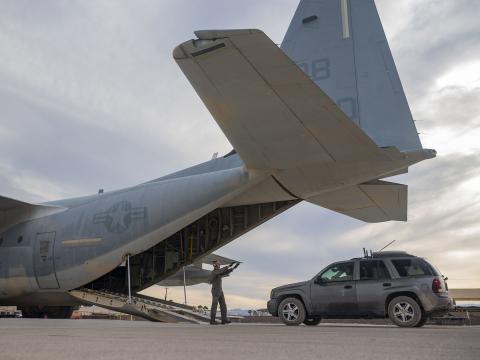 U.S. Marines and their KC-130 aircraft paired with a Chevrolet SUV equipped with commercial and government off-the-shelf components to achieve operation of the first-ever truly mobile command and control capabilities, during the Black Flag 22-1 exercise at the base’s Nevada Test and Training Range on May 12, reported Senior Airman Zachary Rufus from the 57th Wing Public Affairs Office. Credit: Senior Airman Zachary Rufus