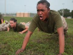 Rct. Emerald Arguelles, Platoon 4037, Papa Company, 4th Recruit Training Battalion, improves her back, core and shoulder strength by doing pushups August 2013 on Parris Island, South Carolina.