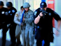 A Las Vegas based law enforcement team partakes in an active shooter exercise near Nellis Air Force Base, Nevada. Photo by Staff Sgt. William Coleman, Nellis AFB Public Affairs. 03.28.2012