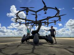 Personnel secure batteries to a Hexa aircraft’s motors at Eglin Air Force Base, Florida, before its flight at a military airfield. Russia’s invasion of Ukraine illustrates the need for the U.S. Defense Department to invest in disruptive technologies, says Logan Jones, president and general manager, SparkCognition Government Systems. Credit:  Samuel King Jr., U.S. Department of Defense