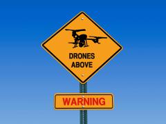 Stopping drones in inhabited areas poses a risk, and countermeasures must account for the possibility of debris affecting people or operation of machines. Credit: RedDaxLuma/Shutterstock