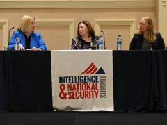 Lori Wade, intelligence community chief data officer (l), speaks with Lt. Gen. Susan Lawrence, USA (Ret.), president and CEO of AFCEA, and Kelly Fletcher, Department of Defense principal deputy chief information officer, at the Intelligence and National Security Summit 2022. Credit: Herman Farrer