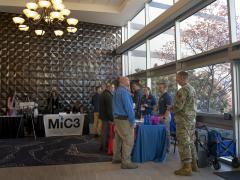 Michigan Air National Guard recruiters hold a recruiting booth during the 2022 Michigan Cyber Summit. Credit: Staff Sgt. Jacob Cessna, U.S. National Guard