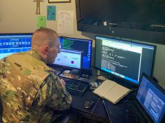 U.S. Army Reserve Maj. Jared Hrabak, a cyber officer with Cyber Protection Team 185 uses a common network scanning tool to enumerate a network. during his unit’s Virtual Battle Assembly Aug. 9, 2020. Although technology companies are laying off thousands of workers, the U.S. Army still seeks tech-savvy personnel.