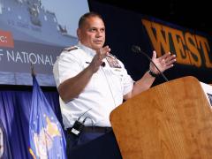 Vice Adm. Andrew Tiongson, USCG, commander, Pacific Area and Defense Force West, addresses the audience at WEST 2023. Credit: Michael Carpenter