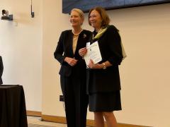 AFCEA President and CEO Lt. Gen. Susan S. Lawrence, USA, (Ret.), right, is inducted into the U.S. Army Women's Foundation Hall of Fame for 2023 on March 22, 2023.. Lawrence stands with Brig. Gen. Anne Macdonald, USA (Ret.), the foundation's president.