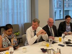 Nathaniel Fick (second from l), ambassador at large, Bureau of Cyberspace and Digital Policy, U.S. Department of State, speaks to reporters on April 12 during a Defense Writers Group event in Washington, D.C.