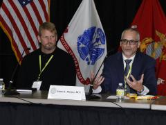 Bill Newhouse, cybersecurity engineer and project lead, National Institute of Standards and Technology (NIST) National Cybersecurity Center of Excellence (l), and James Matney, vice president, defense strategy, Defense Division, General Dynamics Information Technology, deliver a micro keynote at AFCEA's TechNet Cyber in Baltimore.