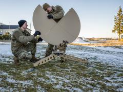 Expanding Knowledge and Accelerating Change: U.S. Air Force Airmen at Ämari Air Base, Estonia, honing their skills in satellite assembly during NATO's collective defense mission. Photo: Staff Sgt. Megan M. Beatty, U.S. Air Force. 