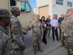 Army Capt. Jacob Soler (c), commander of the battalion logistics company, 2nd Armored Brigade Combat Team, 3rd Infantry Division showcases different technologies in the U.S. Army's Prognostics and Predictive Maintenance Program, or PPMx, to leaders at Fort Stewart in 2022. The military needs a comprehensive strategy, experts say, to fully harness advanced technologies related to command and control. Credit: Staff Sgt. Justin McClarran