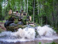 Soldiers navigate a Bradley fighting vehicle through the battlefield during Karelian Lock 23 in Pahkajarvi Training Area, Finland, last month. The Bradley will be replaced by the XM30 Mechanized Infantry Combat Vehicle, an optionally-manned armored vehicle.   Army Sgt. Brayton Daniel