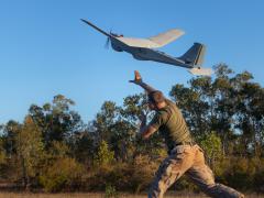 An intelligence specialist launches an RQ-20 Puma drone during an exercise in Australia in 2021 as part of the implementation of concepts of Force Design 2030. Photo: Cpl. Colton K. Garrett, U.S. Marine Corps.