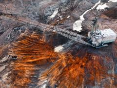 A large walking excavator works in a quarry for the extraction of rare metals. Credit: mykhailo pavlenko/Shutterstock