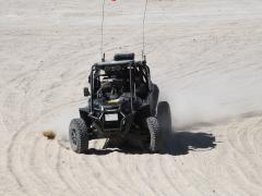 A RACER robotic vehicle achieves a checkpoint and orients itself to the next objective. The second and final phase will include tracked vehicles weighing approximately 9 tons, maps and global planning and tactics capabilities. Credit: DARPA image