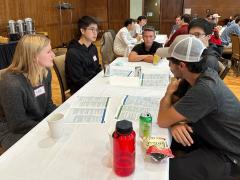 University of Wisconsic students engage in a tabletop exercise facilitated by the Department of Homeland Security and CISA. Photo by Wisconsin National Guard.
