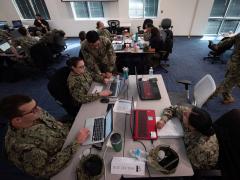 Navy Reserve Sailors from the Naval Information Warfare Systems Command participate in a four-day exercise to teach them strategies in defensive cyber operations. Credit: Joe Bullinger, U.S. Navy.