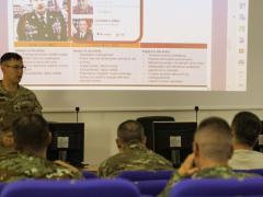 A member of the U.S. Army shares disinformation countermeasures during a joint NATO exercise in Albania. Credit: Capt. Jacob Cantu, U.S. Army Reserve.