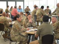 Active duty and retired Air Force leadership give advice to junior enlisted and officers during a speed-mentoring session at Joint Base San Antonio-Kelly. The entire Department of Defense has a cyber personnel shortfall of about 30,000 people. U.S. Air Force photo by Matthew McGovern