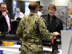 U.S. Navy Vice Adm. Jan Tighe, deputy chief of naval operations for Information Warfare and director of Naval Intelligence, received a brief on underwater sensors while touring the U.S. Navy Information Warfare pavilion at the WEST 2018 conference. Credit: Rick Naystatt, U.S. Navy.