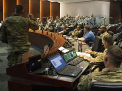 U.S. Army Col. Christopher Wendland, commander of I Corps, 17th Field Artillery Brigade and lead of the U.S. Army Multi Domain Task Force pilot program, briefs the capabilities of the Multi Domain Task Force to joint and combined forces attending the fires symposium during Rim of the Pacific exercise on Fort Shafter, Hawaii, July 2, 2018. Credit: U.S. Army photo by Capt. Rachael Jeffcoat/Released