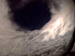 The 53rd Weather Reconnaissance Squadron, known as the Hurricane Hunters, fly inside the eye of Hurricane Lee over the Atlantic Ocean in September 2023 in a WC-130J illuminated by lighting. Credit: U.S. Air Force photo by Lt. Col. Mark Withee