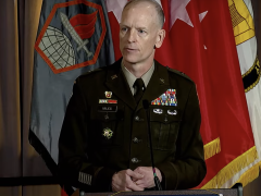 Brig. Gen. Mark Miles, deputy commanding general, Army Cyber Center of Excellence, speaks at TechNet Augusta 2024.