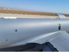 A KC-135 preparing for flight test of a pLEO SATCOM system, utilizing a low-profile phased array antenna. The DEUCSI program is focusing on hybrid SATCOM, using common hardware to communicate with multiple satellite constellations. Credit: The Air Force Research Laboratory.