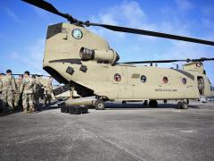 U.S. Air Force cyber operators and maintainers with the 103rd Air Control Squadron, Connecticut Air National Guard, load a Tactical Operations Center-Light (TOC-L) kit onto a U.S. Army CH-47 Chinook in Savannah, Georgia, on May 15, 2024. The 103rd was the first National Guard unit to successfully deploy a cloud-based radar and radio connection from an austere location using the TOC-L. The U.S. Air Force is rolling out the TOC-L “at scale” in FY 2025. Credit: U.S. ANG photo by Master Sgt. Morgan Whitehouse.