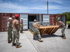 Sailors containerize ordnance in Santa Rita, Guam. Credit: Ivan Skvaril, public affairs and media support specialist, U.S. Navy.