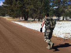 A field tester wears sensors during a ruck march as part of field testing of a wearable patch to measure electrolyte levels in sweat. Credit: GE Global Research.