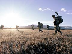 U.S. Army soldiers assigned to 2nd Infantry Brigade Combat Team (Airborne), 11th Airborne Division, move toward their objective on Malamute Drop Zone in Joint Base Elmendorf-Richardson, Alaska, for Arctic Aloha on October 15, 2024. Credit: U.S. Army photo by Spc. Brandon Vasquez