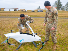Army officials experiment with the blueflite drone. Photo credit: Maj. Wayne Clyne, Oregon National Guard Public Affairs