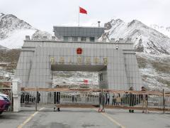 A Chinese border gate stands at the Khunjerab Pass, a region where some of the country’s Uyghur population lives. The Chinese government continues to oppress its citizens, including Uyghurs, outside the country Credit: John Sawar/Shutterstock