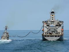 The Military Sealift Command fleet replenishment oiler USNS Pecos (T-AO 197), right, performs a replenishment-at-sea with the South Korean Patrol Combat Corvette Puchon (PCC 773) in the Yellow Sea during exercise Foal Eagle 2013 on March 15, 2013. Sharing of recruitment data could help fill important maritime workforce gaps in the sea services and maritime industrial base workforce. Credit: DOD photo by Petty Officer 3rd Class Declan Barnes, U.S. Navy.