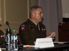 Brig. Gen. Michael Kaloostian, director, Command and Control Cross-Functional Team, Army Futures Command, speaks at TechNet Augusta 2025. Credit: Michael Carpenter Photography