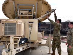 Spc. Klay Walker and Spc. Alexander Best with the 4th Space Company, 1st Space Battalion, work on a Mobile Integrated Ground Suite at Fort Carson, Colorado. U.S. Army Photo by Dottie White