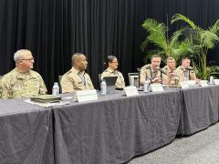 Lt. Col. Adam Brinkman, director of the G6 in the 25th Infantry Division, speaks at TechNet Indo-Pacific 2025 in Honolulu.
