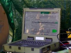 U.S. Soldiers with 1st Battalion, 109th Infantry Regiment, 2nd Infantry Brigade Combat Team, 28th Infantry Division, operate an unmanned aerial system and call for artillery fire during a demonstration at Fort Indiantown Gap, Pennsylvania, in July. Credit: U.S. Army National Guard photo by Maj. Travis Mueller