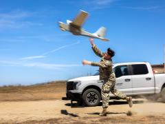 Marine Corps Lance Cpl. Eric Granados launches an RQ-20 Puma during a Dead Center small unmanned aircraft system training event at Marine Corps Base Camp Pendleton, Calif., Aug. 20, 2025. Dead Center is an artificial intelligence-enabled system that enhances the ability of operators of small unmanned aircraft systems to perform a range of surveillance and reconnaissance missions. Credit: Marine Corps Sgt. Trent A. Henry