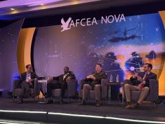 Lt. Col. Andy Ziskin, senior data scientist at the Artificial Intelligence Integration Center, speaks at AFCEA NOVA Army IT Day 2026 held in McLean, Virginia. 