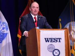 Secretary of the Navy John Phelan delivers a keynote address at WEST 2026. Credit: Karras Photography
