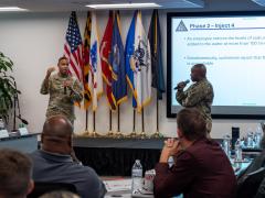 Maryland Army National Guard Col. Louis Patrick Hawkins Jr., and Maryland Air National Guard Lt. Col. Michael S. Graham Jr., lead Maryland National Guardsmen and civilian security and infrastructure cybersecurity experts in a tabletop exercise during the third day of the State of Maryland Critical Infrastructure Cyber Resilience Workshop.  U.S. Air National Guard Photo by Airman 1st Class Sarah Hoover