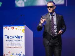 Digital policy adviser at the U.S. Mission to NATO channels Mr. Anderson from "The Matrix" at TechNet International 2026, using the movie's red pill moment as an analogy for NATO's digital wake-up call. Credit: Matthieu Labey Photographer