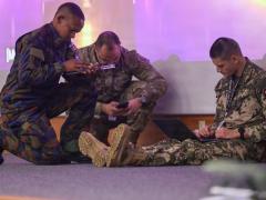 Service members with Kenya (l), U.S. Army (c) and Paraguay (r) collaborate ideas to conduct a cyber challenge at the Professional Education Center in Little Rock, Arkansas, on July 17, 2026. Cyber Shield 2026 is the largest annual U.S. Department of Defense cyber training event, consisting of over 1,000 participants from 44 states and territories as well as 23 countries. Credit: U.S. Army National Guard Photo by Sgt. Brittany Burton/382nd Public Affairs Detachment